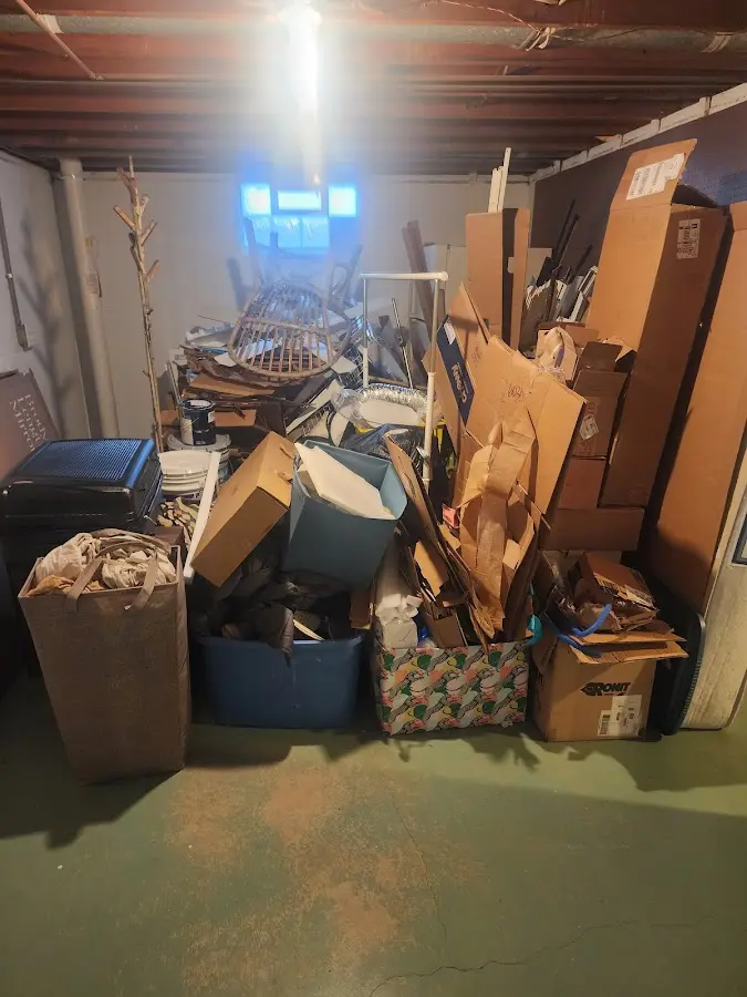 Roll-off dumpster container at job site for 2 Yard Dumpster Rental in Price